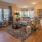 a living room with a large rug
