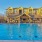 a large pool in front of a building