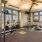 a room with treadmills and windows
