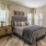 a bedroom with a bed and a table